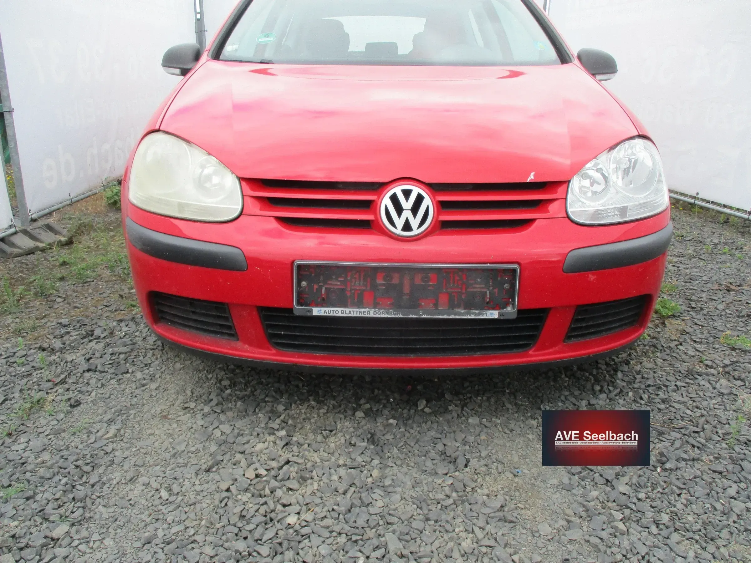 VW Golf 5 Stoßstange vorne Bj 2006 LY3D Tornadorot - Bild 1